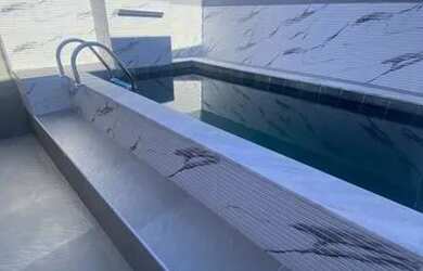 Imagem: A casa possui 3 Dormitórios, 2 Banheiros, 2 Vagas na garagem