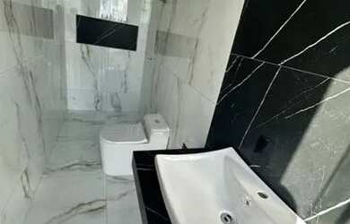 Imagem: A casa em condomínio possui 4 Dormitórios, 5 Banheiros, 4