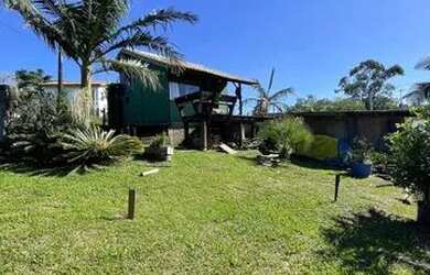 Imagem: A casa possui 1 Dormitório, 1 Banheiro, 2 Vagas na garagem