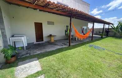 Imagem: A casa possui 2 Dormitórios, 3 Vagas na garagem e está localizado