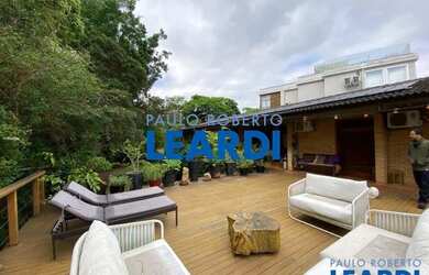 Imagem: A casa em condomínio possui 5 Dormitórios, 5 Banheiros, 4