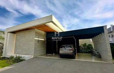 Imagem: A casa possui 3 Dormitórios, 4 Banheiros, 2 Vagas na garagem