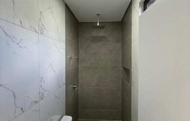 Imagem 6: Seu novo lar em alto padrão - Casa 4 suítes no Condomínio Vista Lagoa