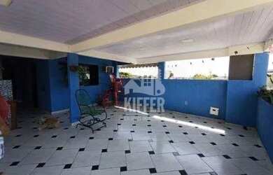 Imagem: A casa possui 5 Dormitórios, 3 Banheiros, 2 Vagas na garagem