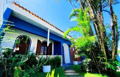 Imagem: A casa possui 4 Dormitórios, 4 Banheiros, 4 Vagas na garagem