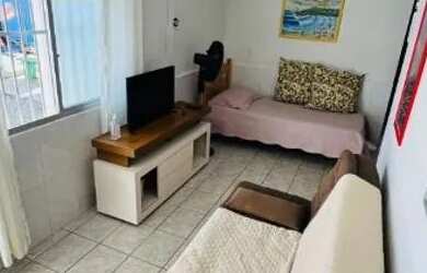 Imagem: A casa possui 2 Dormitórios, 1 Banheiro, 2 Vagas na garagem