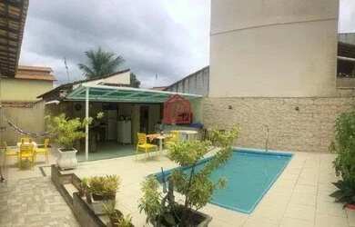 Imagem: A casa possui 3 Dormitórios, 3 Banheiros, 5 Vagas na garagem