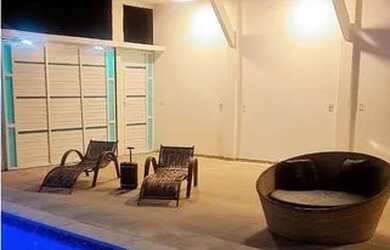 Imagem: A casa possui 5 Dormitórios, 5 Banheiros, 5 Vagas na garagem