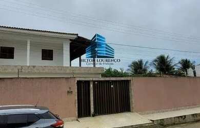 Imagem: A casa possui 4 Dormitórios, 4 Banheiros, 4 Vagas na garagem