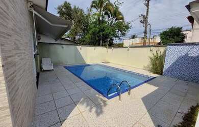 Imagem: A casa em condomínio possui 3 Dormitórios, 4 Banheiros, 2