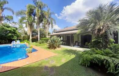 Imagem: A casa em condomínio possui 4 Dormitórios, 4 Banheiros, 5