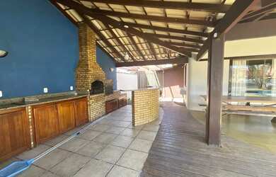 Imagem: A casa possui 3 Dormitórios, 5 Banheiros, 5 Vagas na garagem