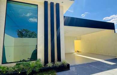 Imagem: A casa possui 3 Dormitórios, 3 Banheiros, 3 Vagas na garagem