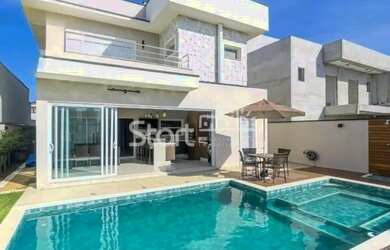 Imagem: A casa em condomínio possui 4 Dormitórios, 5 Banheiros, 4