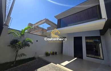 Imagem: A casa possui 3 Dormitórios, 3 Banheiros, 3 Vagas na garagem