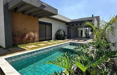 Imagem: A casa em condomínio à venda possui 3 Dormitórios, 4 Banheiros