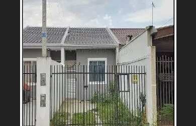 Imagem: A casa possui 1 Dormitório, 1 Banheiro, 1 Vaga na garagem e