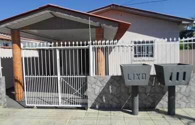 Imagem: A casa possui 3 Dormitórios, 1 Vaga na garagem e está localizado