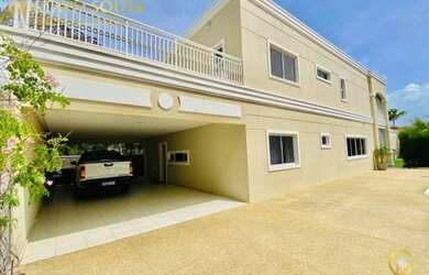 Imagem: A casa possui 4 Dormitórios, 5 Banheiros, 5 Vagas na garagem