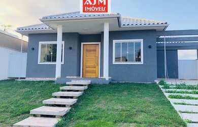 Imagem: A casa possui 4 Dormitórios, 4 Banheiros, 2 Vagas na garagem