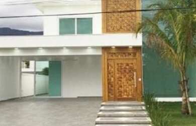 Imagem: A casa em condomínio possui 5 Dormitórios, 5 Banheiros, 4