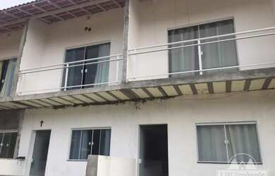 Imagem: A casa possui 2 Dormitórios, 2 Banheiros, 1 Vaga na garagem