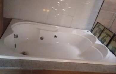 Imagem: A casa possui 5 Dormitórios, 5 Banheiros, 3 Vagas na garagem