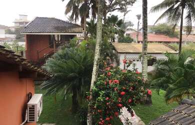 Imagem: A casa possui 4 Dormitórios, 5 Banheiros, 5 Vagas na garagem