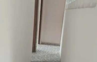 Imagem: A casa possui 3 Dormitórios, 2 Banheiros, 1 Vaga na garagem