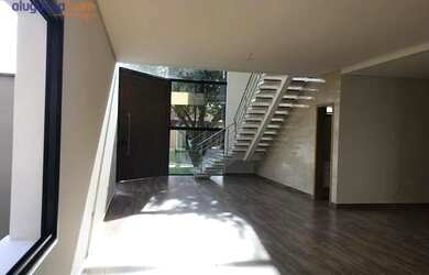 Imagem: A casa em condomínio possui 4 Dormitórios, 5 Banheiros, 4