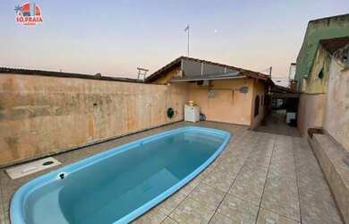 Imagem: A casa possui 2 Dormitórios, 2 Banheiros, 2 Vagas na garagem