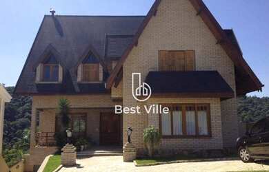 Imagem: A casa em condomínio possui 5 Dormitórios, 5 Banheiros, 5