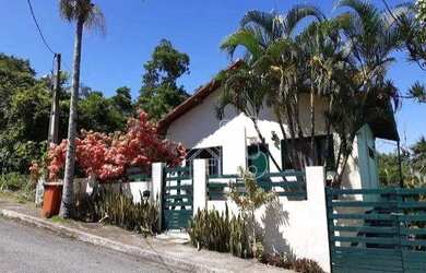 Imagem: A casa possui 5 Dormitórios, 5 Banheiros, 1 Vaga na garagem