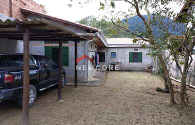 Imagem: A casa possui 2 Dormitórios, 2 Banheiros, 4 Vagas na garagem