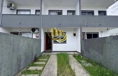 Imagem: A casa possui 2 Dormitórios, 2 Banheiros, 1 Vaga na garagem