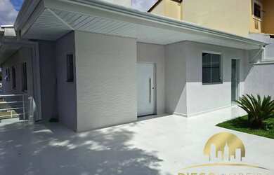 Imagem: A casa possui 3 Dormitórios, 5 Banheiros, 3 Vagas na garagem