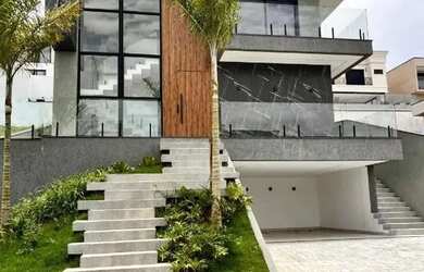 Imagem: A casa em condomínio possui 4 Dormitórios, 5 Banheiros, 4