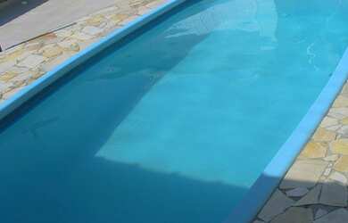 Imagem: A casa possui 3 Dormitórios, 2 Banheiros, 3 Vagas na garagem