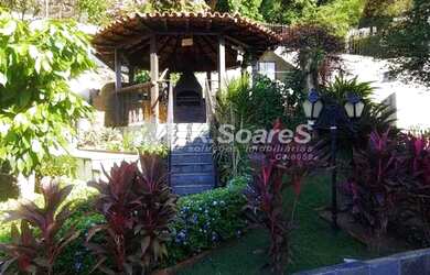 Imagem: A casa em condomínio possui 5 Dormitórios, 5 Banheiros, 5