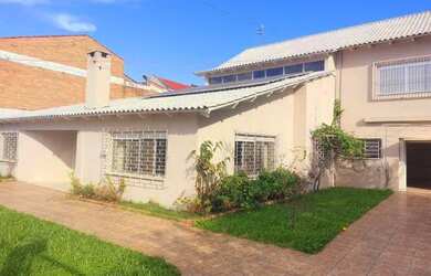 Imagem 2: Casa em Guaíba. Piscina, Churrasqueira, Área de serviçoeLareira