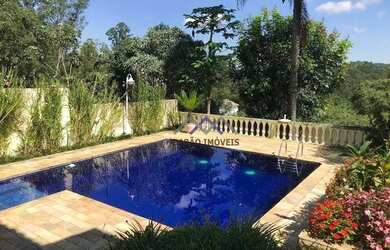 Imagem: A casa em condomínio possui 4 Dormitórios, 2 Banheiros, 2