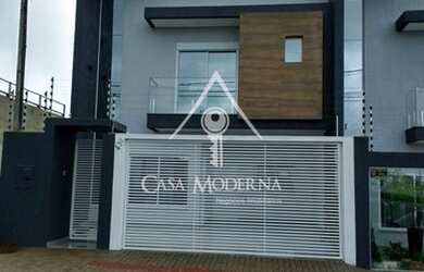 Imagem: A casa possui 3 Dormitórios, 4 Banheiros, 2 Vagas na garagem