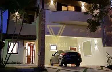 Imagem: A casa possui 4 Dormitórios, 4 Banheiros, 4 Vagas na garagem