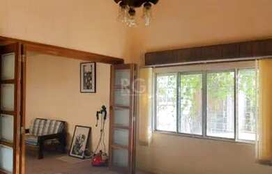 Imagem 9: Casa em Guaíba. Piscina, Churrasqueira, Área de serviçoeLareira