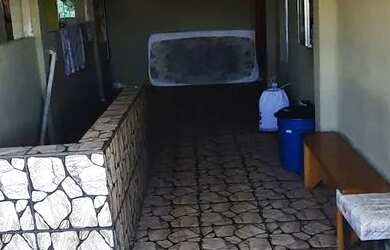 Imagem: A casa possui 3 Dormitórios, 2 Banheiros, 4 Vagas na garagem