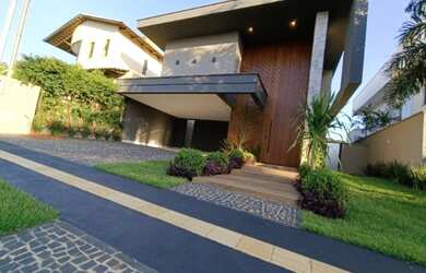 Imagem: A casa em condomínio possui 5 Dormitórios, 5 Banheiros, 4