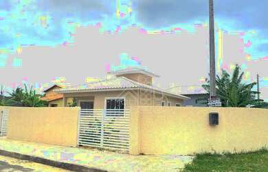 Imagem: A casa possui 2 Dormitórios, 2 Banheiros, 2 Vagas na garagem