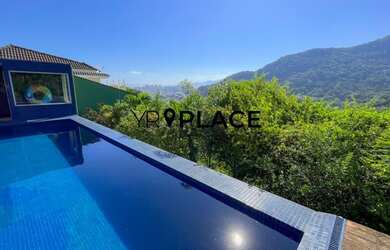 Imagem: A casa em condomínio possui 4 Dormitórios, 5 Banheiros, 3