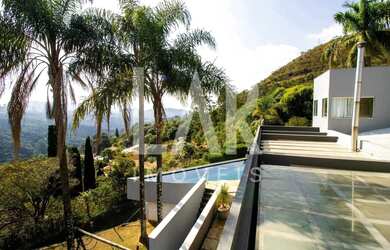 Imagem: A casa em condomínio possui 4 Dormitórios, 4 Banheiros, 5