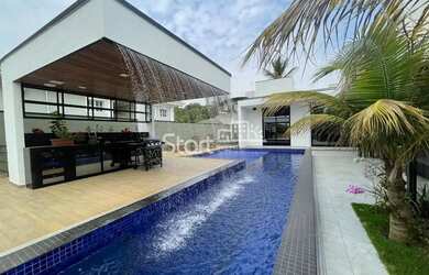 Imagem: A casa em condomínio possui 4 Dormitórios, 5 Banheiros, 5